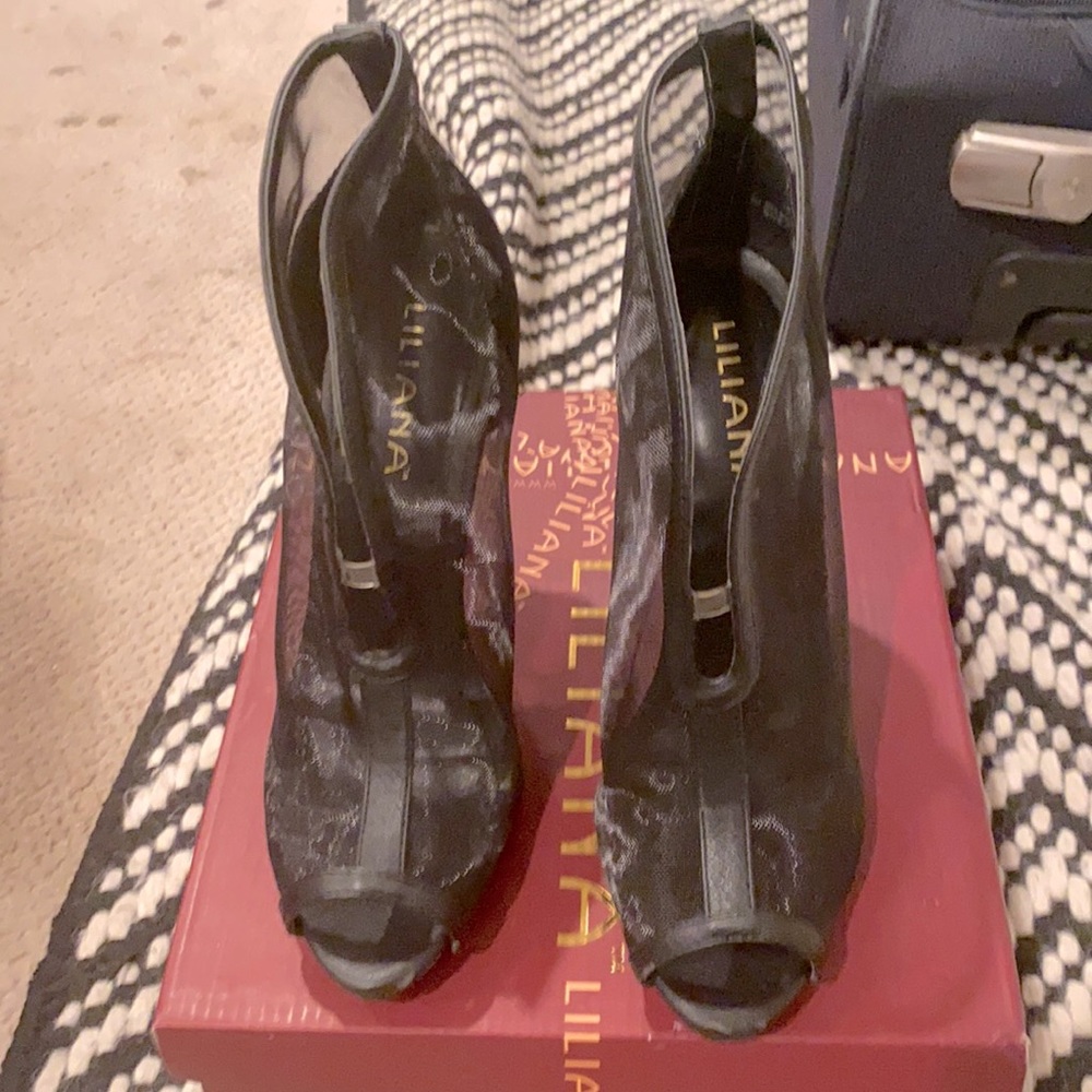 Nwb fabulous high heel peek toe bootie . All the rage